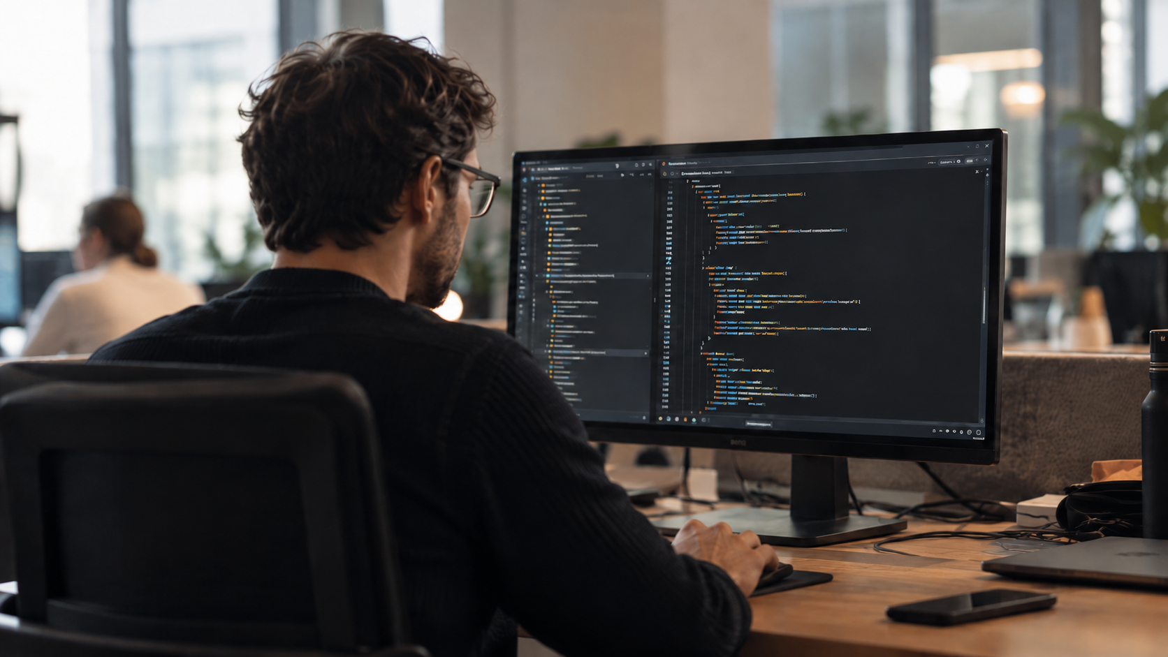Software developer working on a tailored solution